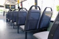 Bus seats on empty double decker bus. Blank advertising space; for mockup display; bus seat sticker wrap Royalty Free Stock Photo