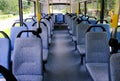 Bus seats on empty double decker bus. Blank advertising space; for mockup display; bus seat sticker wrap Royalty Free Stock Photo