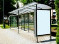 Composite image of bus shelter with blank poster ad and billboard lightbox panel Royalty Free Stock Photo