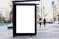 bus shelter with blank white ad billboard at busstop. urban street setting