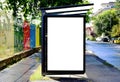 bus shelter at bus stop. blank lightbox billboard ad sign. white poster space. Royalty Free Stock Photo