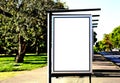 bus shelter at bus stop. blank lightbox billboard ad sign. white poster space.