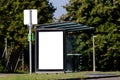 Bus shelter at a bus stop of glass and aluminum structure Royalty Free Stock Photo