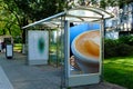 Bus shelter and bus stop. glass light box side ad panel. colorful sample image for mock-up Royalty Free Stock Photo