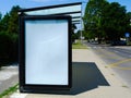 Bus shelter of glass & aluminum structure with ad space