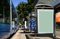 Bus shelter with white advertising lightbox poster ad panel Royalty Free Stock Photo