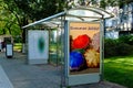 Glass structure bus shelter in urban setting. advertisement and commercial concept.