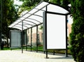 Bus shelter with white poster ad display glass. outdoor billboard and ad sign panel Royalty Free Stock Photo