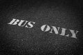 Bus Only Sign Painted on Roadway Asphalt for Direction Royalty Free Stock Photo