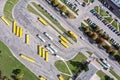 Bus station with parked yellow busses. city public transportation. aerial view