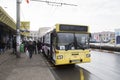 People getting down from a trolleybus 