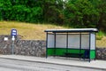 Bus stop with blue traffic sign Royalty Free Stock Photo