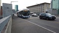 Bus stop on Hardbrucke bridge in Zurich city Switzerland car traffic and people
