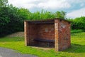 Bus stop on a rural road Royalty Free Stock Photo