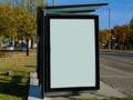 Bus shelter. clear glass design with white ad space. Royalty Free Stock Photo