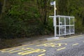 Bus stop shelter rural countryside uk public transport free travel pensioner senior person commute Royalty Free Stock Photo