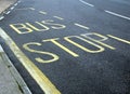 Bus stop sign lane Royalty Free Stock Photo