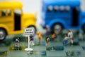 Bus stop signs with Blur of Teacher and a group of elementary sc Royalty Free Stock Photo