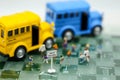 Bus stop signs with Blur of Teacher and a group of elementary sc Royalty Free Stock Photo