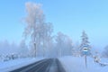 Bus stop by the snowy road Royalty Free Stock Photo