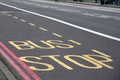 Bus stop street information on a bus lane Royalty Free Stock Photo