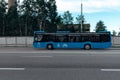 Bus on the street of Moscow. City-Shuttle blue bus on the street
