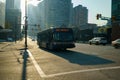 24 bus to Lynn Valley driving down a sunny road in downtown Vancouver