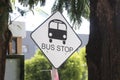 Bus top sign in the road where but stops Royalty Free Stock Photo