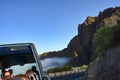 A bus travels the serpentine road in the mountains on the Canary Island of Tenerife, Spain Royalty Free Stock Photo