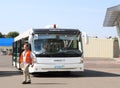 Bus and unidentified airport worker in Kyiv, Ukraine