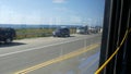 Bus window, pacific coast highway, freeway 101, California USA. Road trip along summer ocean or sea.