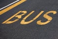 Bus written on asphalt