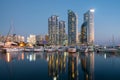 Busan city skyline view at Haeundae district, Gwangalli Beach with yacht pier at Busan, South Korea Royalty Free Stock Photo