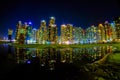 Busan cityscape at nighttime with reflection at Haeundae beach