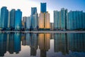 Busan cityscape at nighttime with reflection at Haeundae beach.