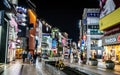 Gwangbok-dong Culture and Fashion shopping street view illuminated at night with people in Busan South Korea