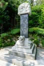 A black stone inscription decorate with Chinese mythology dragon and turtle white stones