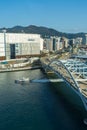 Busan,South Korea-September 2020: Cruise ship passing by at Busan Yeongdodaegyo Bridge with skyscraper city view
