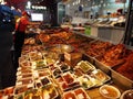 A man in a street food store in Busan Jagalchi Market