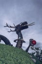 Statue of dragon holding red sphere in Haedong Yonggung Temple