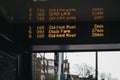 Buses schedule on digital screen on a bus stop in London, UK