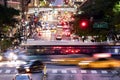 Buses and taxis driving through a busy intersection 42nd Street through Midtown Manhattan in New York City