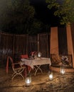 Bush dinner table with lanterns, South Africa Kwazulu natal, luxury safari lodge in the bush Royalty Free Stock Photo