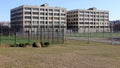 Bush Terminal Park, veiw of the sports field and semi-abandoned industrial buildings in the background, Sunset Park, Brooklyn, NY