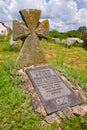Monument and tombstone in a yard of ruined castle to a warrior hero of Bohdan Khmelnytsky rebellion