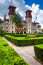 Bushes and Ponce de Leon Hall at Flagler College, in St. Augustine, Florida. Royalty Free Stock Photo