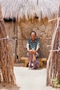 Bushman sitting in shade Royalty Free Stock Photo