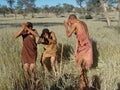 Bushmen hunters in a fields search Royalty Free Stock Photo