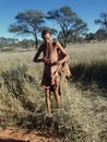Bushmen hunters in a fields search Royalty Free Stock Photo