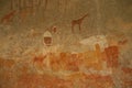 Bushmen rock painting of human figures and antelopes, giraffe of the Matopos National Park, Zimbabwe